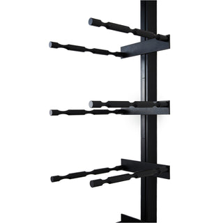 Caption Close-Up Of Empty Triple-Depth Wine Pegs Installed On Vertical Floor-To-Ceiling Bar