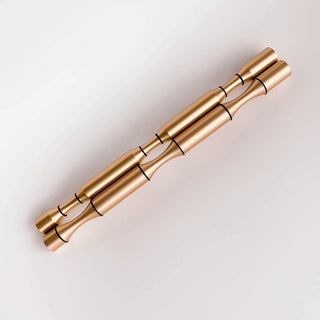 caption Triple Deep Bright Gold Pegs with Black Rubber Rings (discontinued peg finish, available while stock lasts)