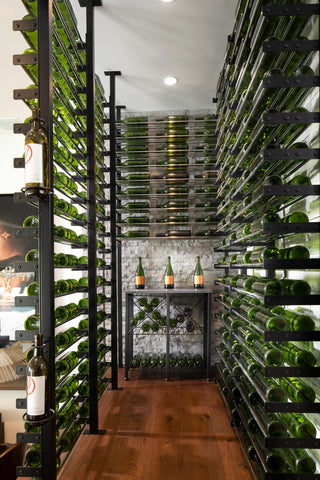 A complete wine cellar installation with Evolution floor-to-ceiling mounting posts